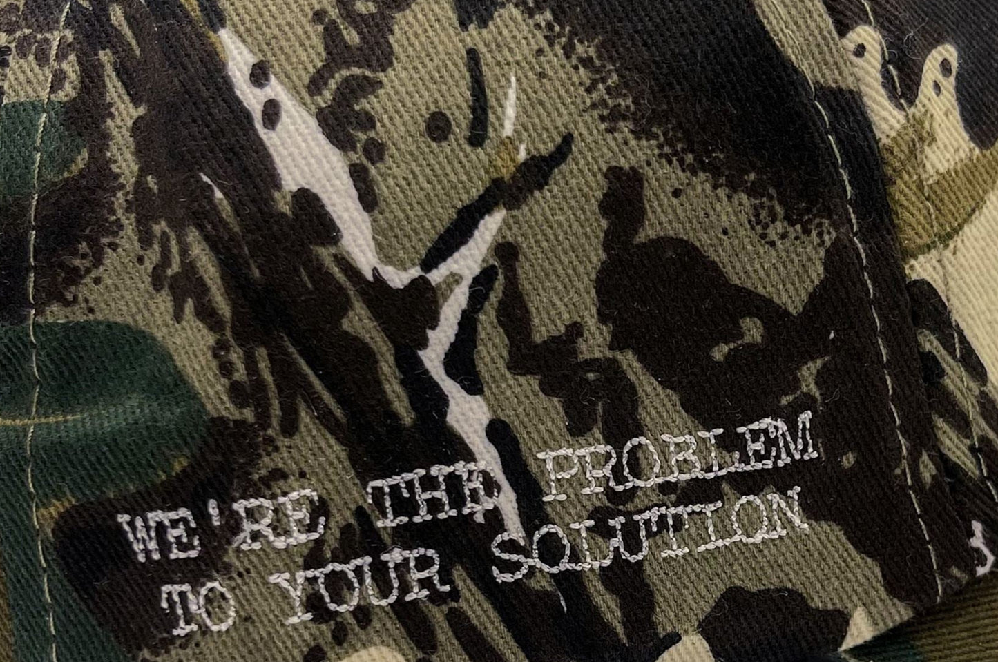 WE'RE THE PROBLEM CAMOUFLAGE CAP